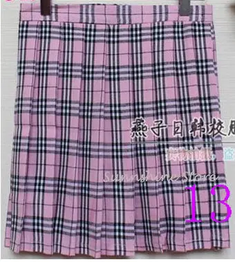 Stylish red A-line midi skirt featuring high-waist design, classic pleats, and authentic tartan plaid—ideal for school uniforms or casual wear. - Image 5