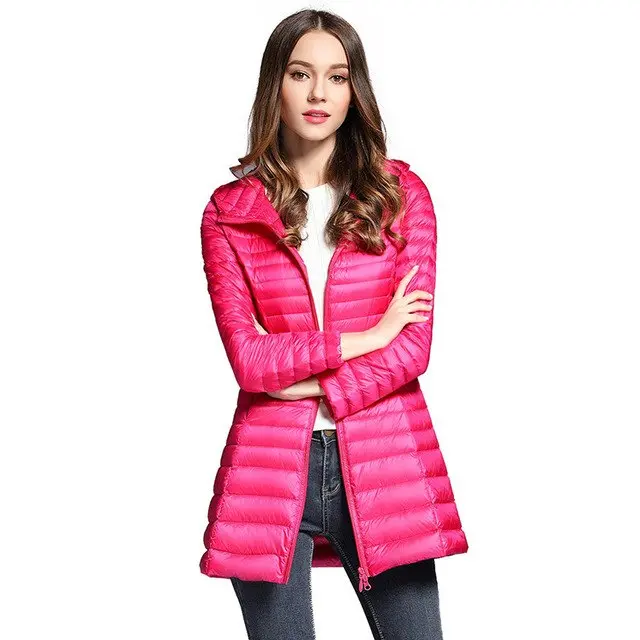 Stay warm and stylish this winter with our women's long down jacket—featuring ultra-lightweight construction, premium duck down insulation, a cozy quilted design, and a functional hood. - Image 9
