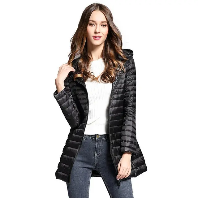 Stay warm and stylish this winter with our women's long down jacket—featuring ultra-lightweight construction, premium duck down insulation, a cozy quilted design, and a functional hood. - Image 7