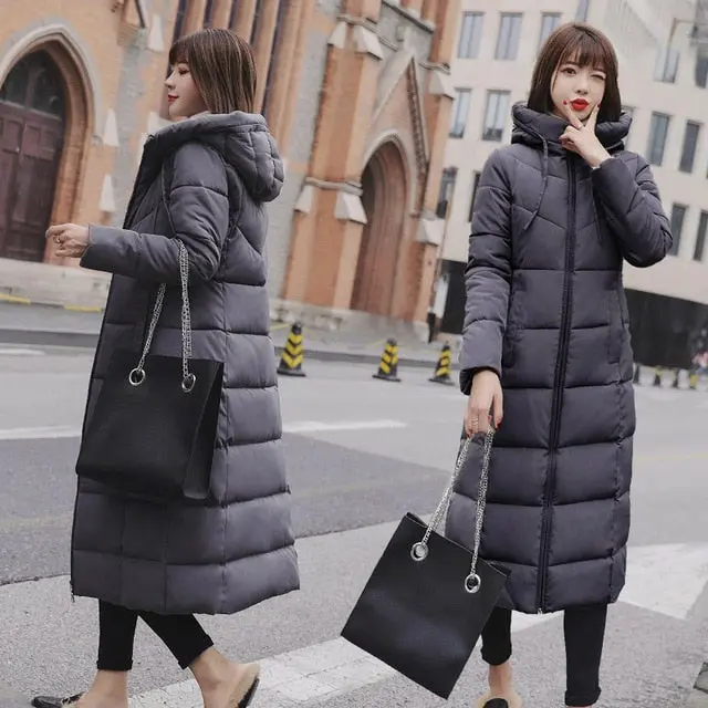 Stylish plus size long down parka featuring a cozy hood, premium insulation, and modern design—ideal for cold autumn and winter days. - Image 4