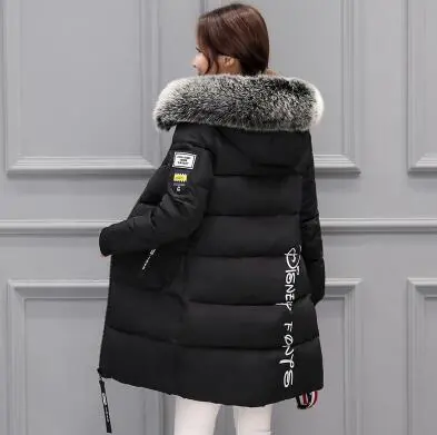 Stylish 2018 women's long down parka featuring a luxurious fur-trimmed hood, thick insulated cotton lining, and windproof design—available in extended sizes for ultimate warmth and comfort. - Image 8