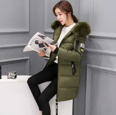 Stylish 2018 women's long down parka featuring a luxurious fur-trimmed hood, thick insulated cotton lining, and windproof design—available in extended sizes for ultimate warmth and comfort. - Image 5